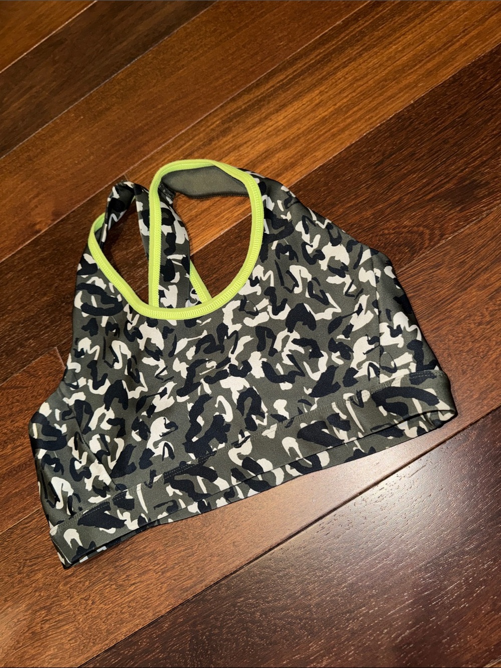 Soul Cycle NWOT sports bra camo print with bright green trim, size M